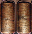 Inrō with the “Fifty-three Stations of the Tōkaidō”, Five cases; lacquered wood with gold and silver takamaki-e, hiramaki-e, togidashimaki-e, cut-out gold foil on gold and nashiji groundNetsuke: carved wood; Kintarō beating a TenguOjime: gold bead with stag in relief , Japan
