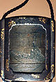 Case (Inrō) with Design of Court Lady in a Boat (obverse); Willow Tree (Asazuma) (reverse), Silver inlay with incised and applied gold decoration 
Ojime: silver bead 
Netsuke: bronze disk with metal inlay, Japan