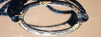 Case (Inrō) with Design of Court Lady in a Boat (obverse); Willow Tree (Asazuma) (reverse), Silver inlay with incised and applied gold decoration 
Ojime: silver bead 
Netsuke: bronze disk with metal inlay, Japan