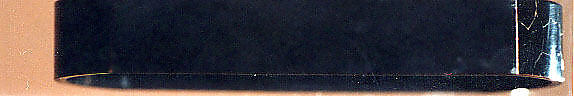 Case (Inrō) in the Shape of an Ink Stick with Design of Hotei (Putai) (obverse); Musical Instruments (reverse), Attributed to Shibata Zeshin (Japanese, 1807–1891), Roiro ('waxen') lacquer with black hiramakie sprinkled and polished lacquer and takamakie sprinkled and polished lacquer relief; Interior: roiro; Netsuke: nut carved with Chinese sages and attendants; Ojime: carved peach stone with landscape and figures, Japan