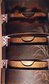 Case (Inrō) with a Fox from the Kyōgen Play The Fox Hunter (Tsurigitsune); Hunter behind Haystacks from the Kyōgen Play "Hakuzōsu" (reverse), Shibata Zeshin (Japanese, 1807–1891), Gold and silver maki-e with colored lacquer on black lacquer
Ojime: gilded metal with fox-monk
Netuske: Lacquer oval box with diamond floral design (signed Kiyoharu), Japan