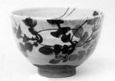 Teabowl, Roughly moulded, showing wheelmarks; fawn-colored clay, light gray glaze almost to the foot; design of daikon (large radish) in brown outlines with leaves in brown and blue (Awata ware), Japan