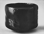 Teabowl, Ichigen, Clay covered with a pitted, black glaze (Raku ware), Japan