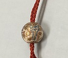 Ojime, Faience, covered with cream colored glaze, crackled and decorated with gold and enamels (Satsuma ware), Japan
