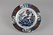 Plate with bird and flowers, Porcelain painted in underglaze blue and overglaze iron red, China