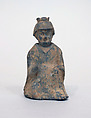 Figure of a seated man, Earthenware with pigments, China
