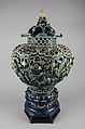 Covered Jar on a Pedestal, Stoneware with carved, pierced, and relief decoration in the biscuit, and under colored glazes (Shanxi Fahua ware), China