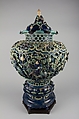 Covered Jar on a Pedestal, Porcelaneous stoneware with carved, pierced, and relief decoration in the biscuit, and under colored glazes, China