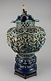 Covered Jar on a Pedestal, Porcelaneous stoneware with carved, pierced, and relief decoration in the biscuit, and under colored glazes, China