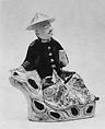 Figure of Seated Gentleman, Porcelain painted in famille verte enamels on the biscuit, China