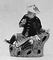 Figure of Seated Gentleman, Porcelain painted in famille verte enamels on the biscuit, China