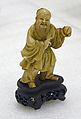 Shoulao, the God of Longevity, Holding a Peach, Ivory; rosewood stand, China
