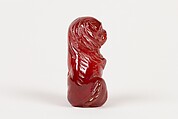 Netsuke of Seated Dog (one of a pair), Amber, Japan