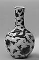 Vase with dragons amid floral sprays, Porcelain painted in underglaze cobalt blue and copper red (Jingdezhen ware), China