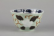 Bowl with dragon and floral pattern, Porcelain painted in underglaze cobalt blue, with relief decoration, and celadon and dark brown glazes, China
