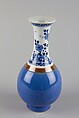 Vase with flowers and rocks, Porcelain painted in underglaze cobalt blue, with brown and blue glazes (Jingdezhen ware), China