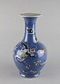 Vase with dragon, Porcelained decorated in low relief with underglaze painting against a blue glaze (Jingdezhen ware), China
