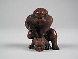 Figure of a Man Killing a Demon, Wood; inlaid eyes, Japan