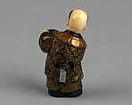 Netsuke of Boy with a Fan, Lacquered; head of ivory, Japan
