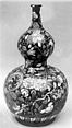 Vase, White porcelain decorated with blue under the glaze and colored enamels on a black enamel background; (style of Chinese famille noire), Japan