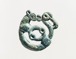 Garment Plaque in the Shape of a Coiled Panther, Bronze, Eastern Kazakhstan