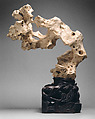 Large rock with pronounced overhang and perforations, White Taihu limestone; wood stand, China