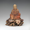 Seated luohan holding a book, Soapstone, China