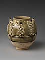 Jar with floral decorations and musicians, Stoneware with applied decoration under celadon glaze, China