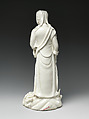 Bodhisattva Guanyin standing on a dragonfish, Porcelain with ivory glaze (Dehua ware), China