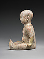 Sitting boy, Earthenware with slip, China
