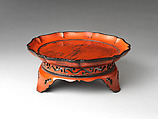 Flower-shaped Negoro Tray (Kōban) with Three Feet, Wood with coatings of red over black lacquer (Negoro ware), Japan
