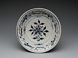 Dish with six-petalled flower design and floral scroll on cavetto, Stoneware painted with cobalt blue under a transparent glaze, Vietnam, probably Hai D’uong Province