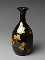 Sake bottle with grapevine decoration, Gold and silver makie on black lacquer, Japan