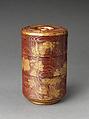 Picnic set with decoration of chrysanthemum and autumn grasses, Sprinkled gold and silver maki-e on red lacquer cabinet; sprinkled gold and black lacquer on red lacquer boxes; Kyoto-ware sake bottle (glazed stoneware with enamels), Japan