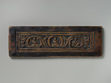 Manuscript Cover with the Buddha Shakyamuni, Attended by Manjushri and Vajrapani 

, Wood with traces of red paint, Tibet