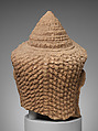 Head of a Deity(?), Red sandstone, Cambodia