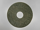 Annular disk with granulation and animal masks (bi), Jade (nephrite), China