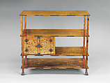 Shelf for Cosmetic Boxes (Kuro-dana) with Pine, Bamboo, Cherry Blossoms, and Crests of the Matsudaira and Shimazu Families, Lacquered wood with gold and silver takamaki-e, hiramaki-e, and togidashimaki-e, and cutout gold- and silver-foil application on gold nashiji (“pear-skin”) ground	, Japan