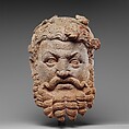 Head of Dionysos (The God of Wine and Divine Intoxication), Terracotta, Pakistan (ancient region of Gandhara)