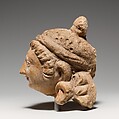 Head of a Female Figure, Stucco with traces of color, Pakistan (ancient region of Gandhara)