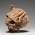 Head of a Female Figure, Stucco with traces of color, Pakistan (ancient region of Gandhara)