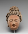 Head of a Buddha, Clay with pigments, Pakistan (ancient region of Gandhara) or Afghanistan