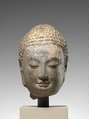 Head of a Buddha, Limestone with traces of pigment and gilding, China