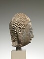 Head of a Buddha, Limestone with traces of pigment and gilding, China