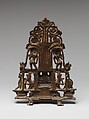 Enthroned Jina Attended by a Yaksha, a Yakshi, and Chauri-Bearers, Copper alloy, India (Karnataka)