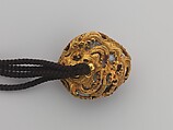 Tobacco Pouch and Pipe with Netsuke of Freshwater Pearl in Gold Mount, Pouch: Dutch embossed leather with silver foil, and color
Clasp: gold, shakudō and shibuichi
Ojime: gold
Netsuke: freshwater pearl and gold
Pipe: metal
Pipe case: Dutch embossed leather with silver foils, and color, Japan