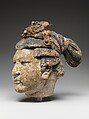 Head of Attendant, Unfired clay with pigment and gilding, China