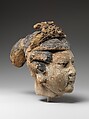 Head of Attendant, Unfired clay with pigment and gilding, China