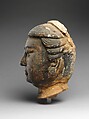 Head of attendant, Unfired clay with traces of pigment and gilding, China