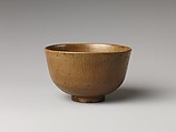 Teabowl, Clay;  glaze with waving lines and pattern in white Mishimi (Tsushima ware), Japan